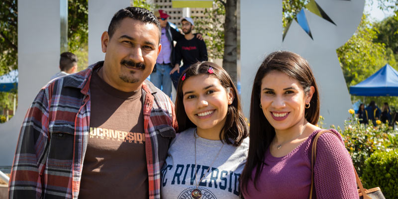 UC Riverside students and Scotty the Bear on campus
